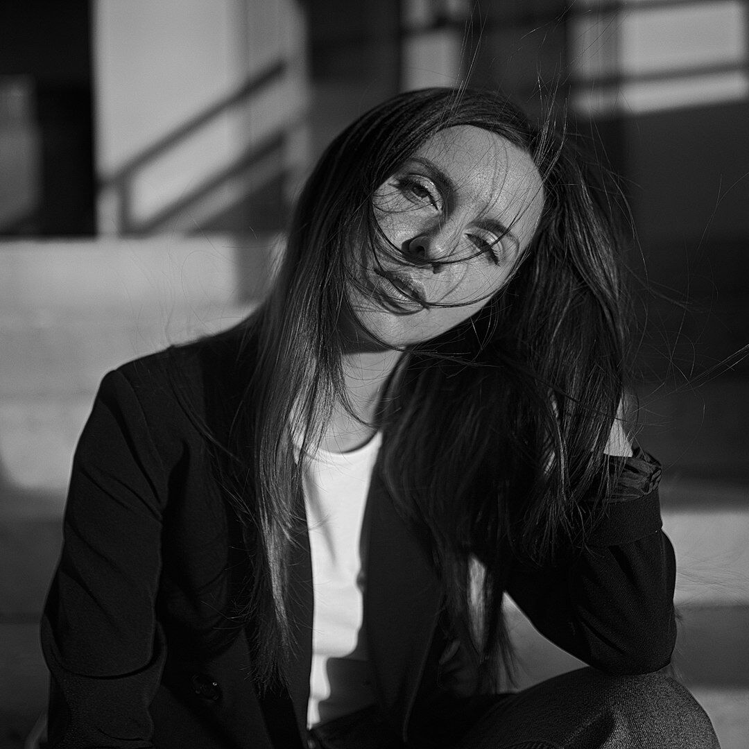 Professional Brazilian woman in business attire smiling